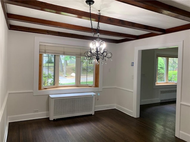 unfurnished dining area with baseboards, dark wood-type flooring, an inviting chandelier, and radiator heating unit