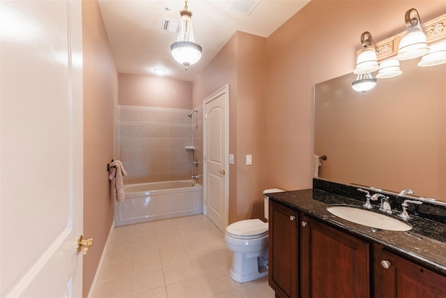 bathroom with vanity, toilet, tub / shower combination, and visible vents