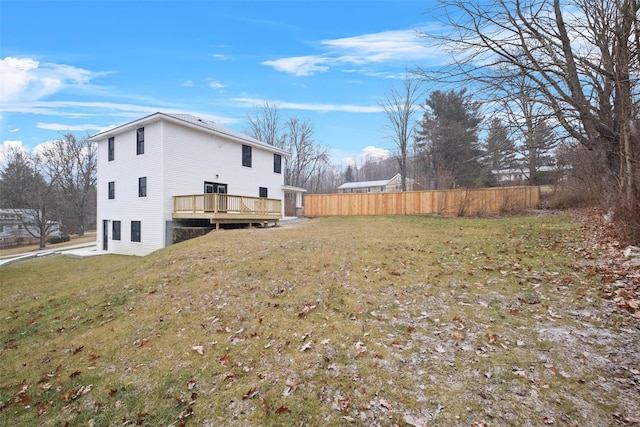 exterior space featuring a deck and fence