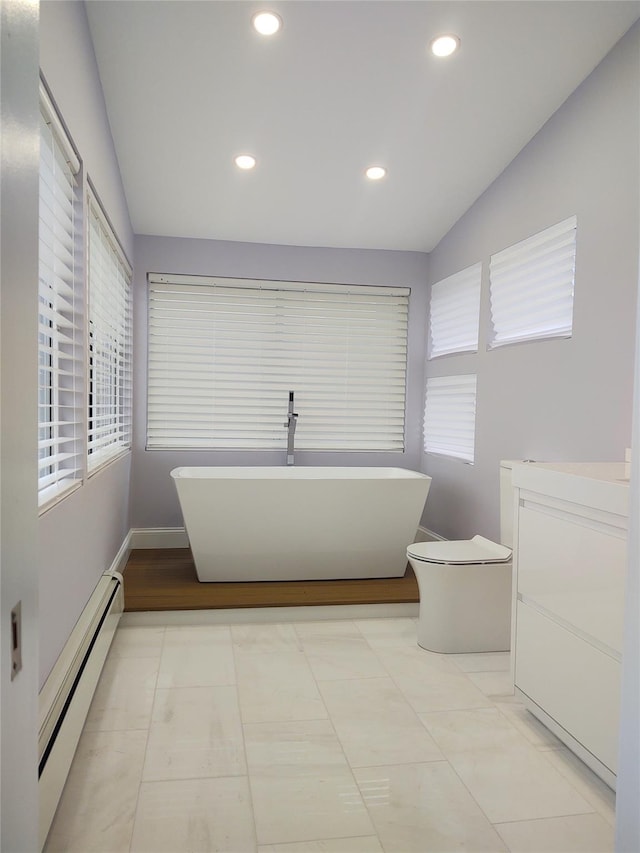 full bathroom with lofted ceiling, a soaking tub, recessed lighting, and a baseboard radiator