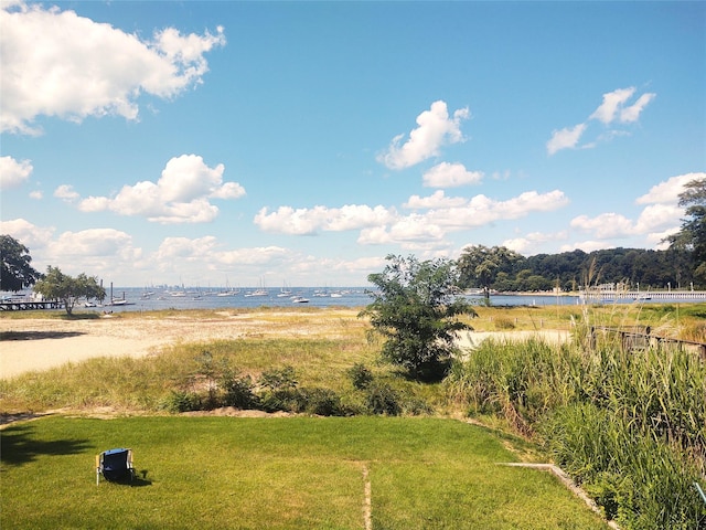 view of yard with a water view