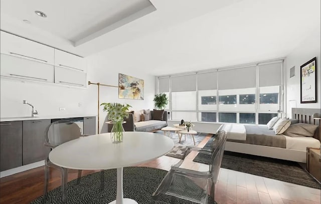 dining area with wood finished floors