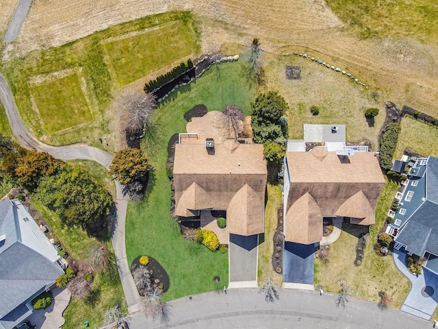 birds eye view of property with a residential view