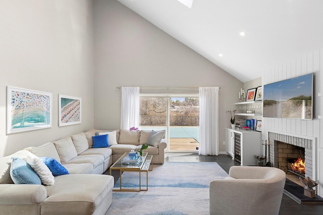 living room featuring a fireplace, high vaulted ceiling, and dark wood-style flooring