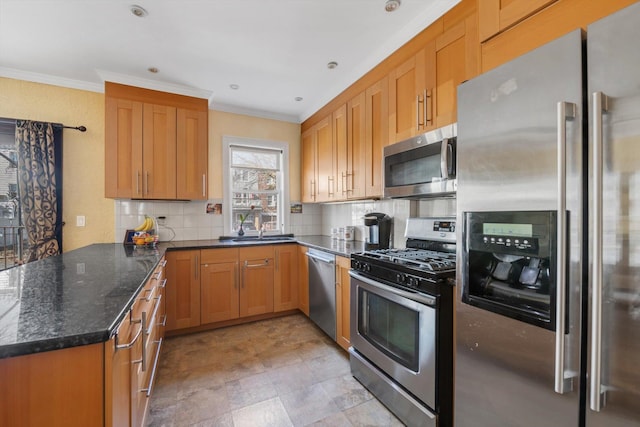 kitchen with tasteful backsplash, stainless steel appliances, dark stone counters, a peninsula, and crown molding