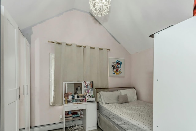 bedroom with lofted ceiling and an inviting chandelier