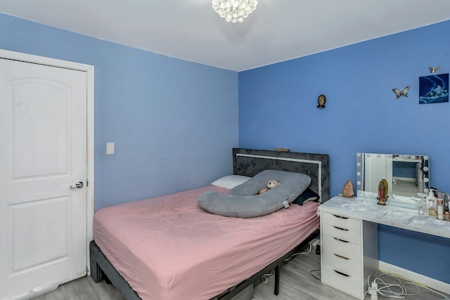 bedroom with light wood-type flooring