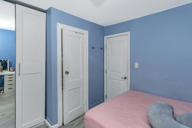 bedroom featuring light wood-type flooring