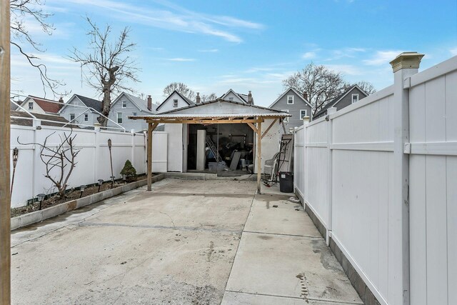 garage featuring fence