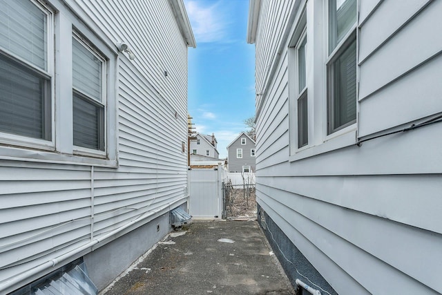 view of property exterior featuring fence