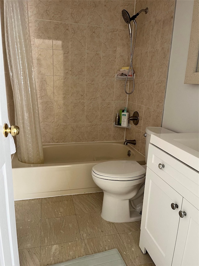 full bath featuring shower / tub combo with curtain, toilet, and vanity