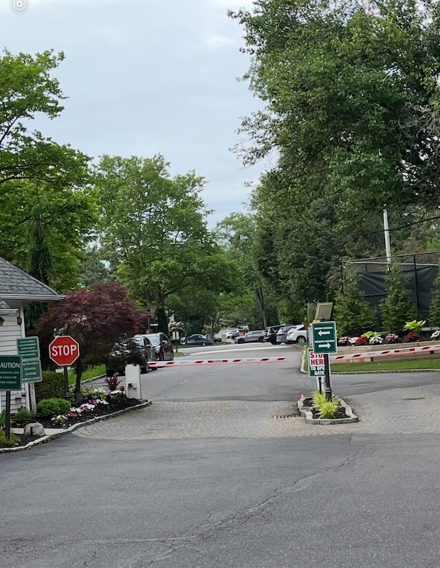 109 Glen Way, Syosset, NY 11791 - view of asphalt street with traffic signs and curbs