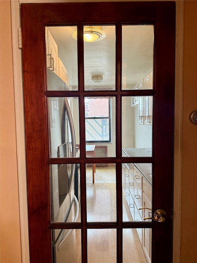 details with french doors and stainless steel fridge