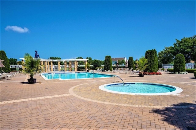 community pool with a patio