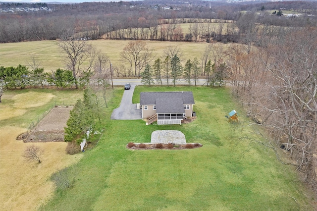 birds eye view of property with a rural view
