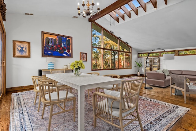 714 Ladd Rd, Bronx, NY 10471 - dining area featuring a chandelier, wood finished floors, and high vaulted ceiling