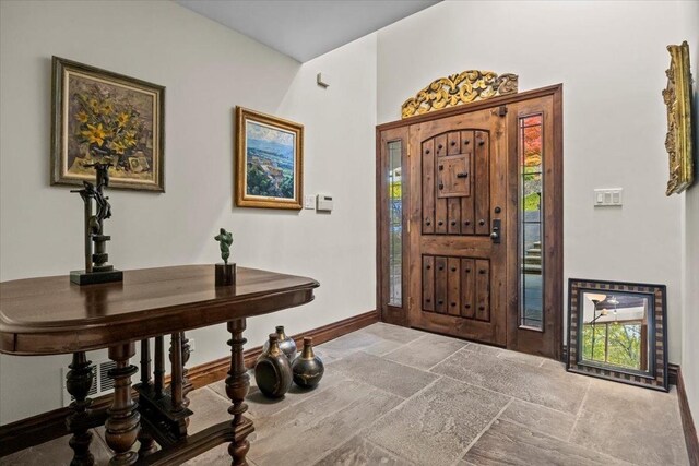 714 Ladd Rd, Bronx, NY 10471 - foyer entrance with stone tile floors and healthy amount of natural light