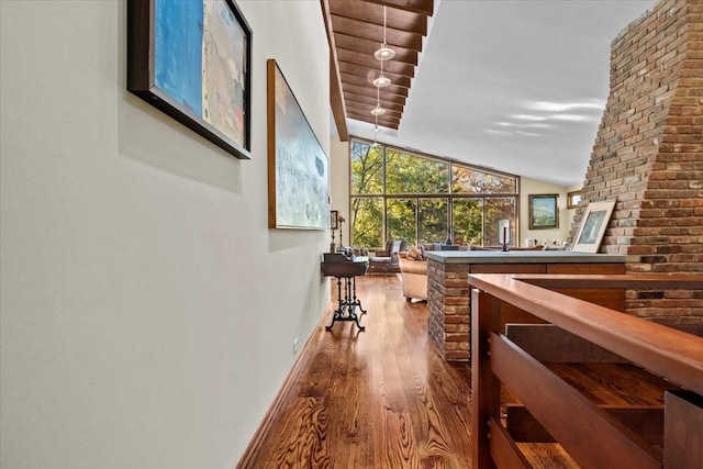 714 Ladd Rd, Bronx, NY 10471 - hallway featuring wood finished floors and high vaulted ceiling