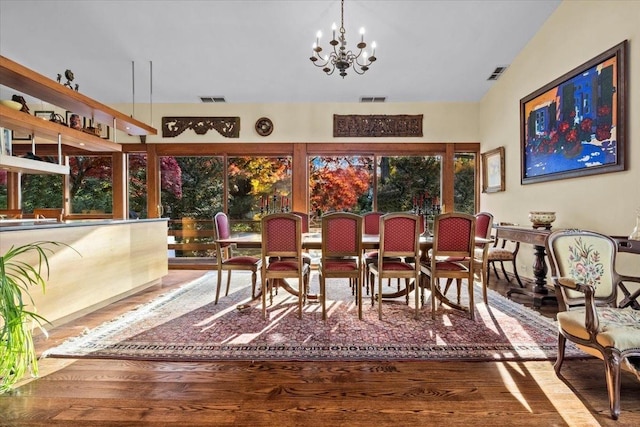 714 Ladd Rd, Bronx, NY 10471 - dining room featuring a chandelier and wood finished floors