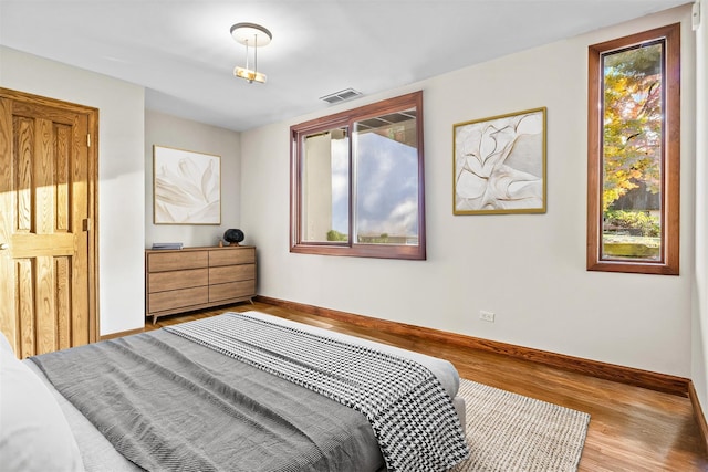 714 Ladd Rd, Bronx, NY 10471 - bedroom featuring wood finished floors and baseboards
