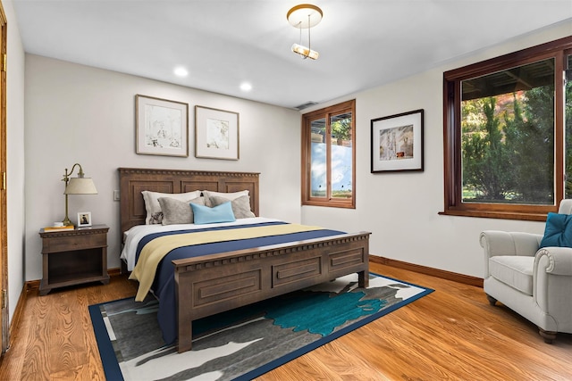 714 Ladd Rd, Bronx, NY 10471 - bedroom with light wood-style floors and recessed lighting
