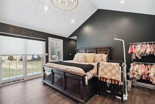 bedroom with recessed lighting, lofted ceiling, wood finished floors, and access to outside