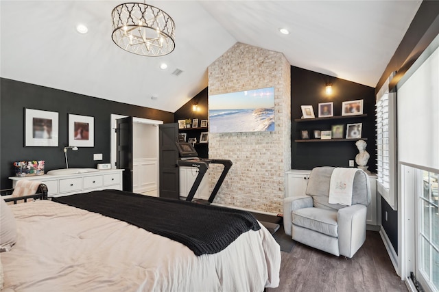 bedroom with visible vents, wood finished floors, recessed lighting, an inviting chandelier, and vaulted ceiling