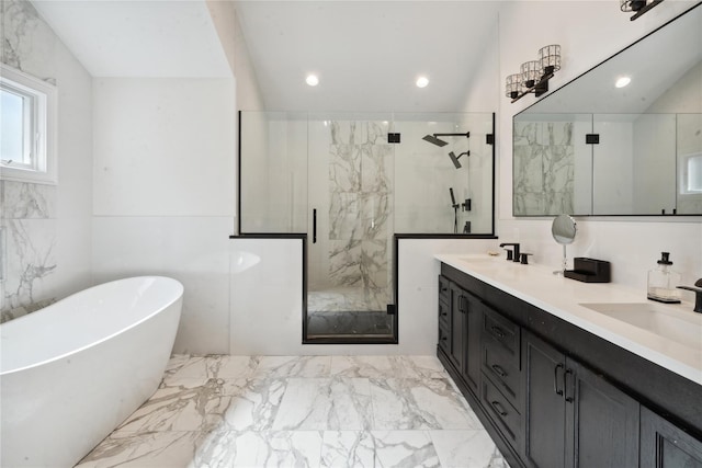 full bath featuring a marble finish shower, a soaking tub, marble finish floor, and a sink