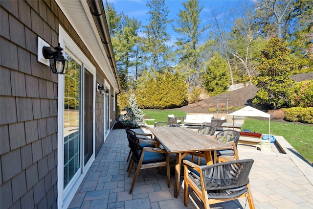 view of patio with outdoor dining area