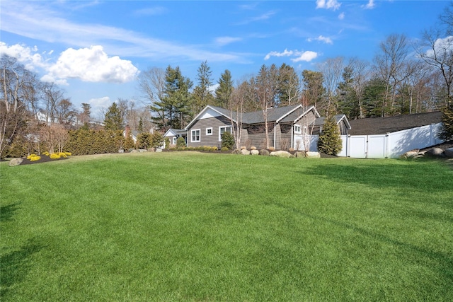 view of yard with a gate and fence