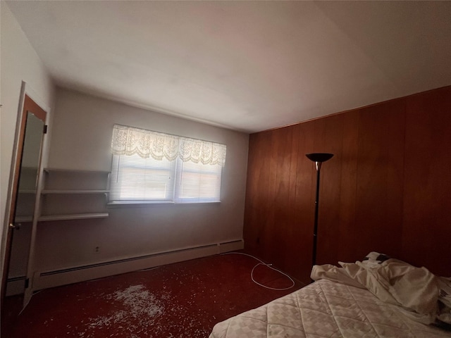 unfurnished bedroom with baseboard heating