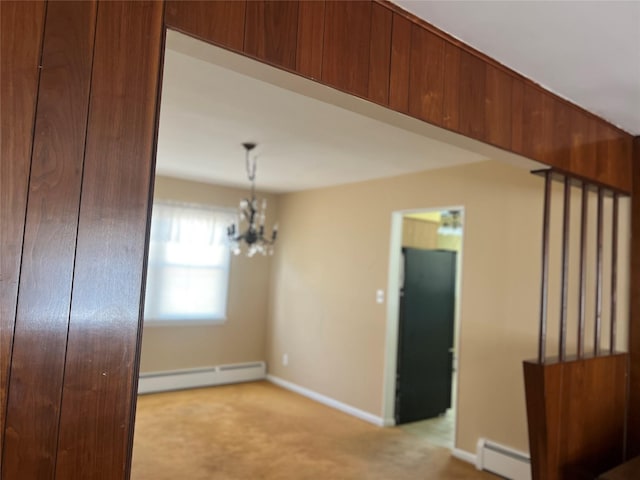 interior space featuring a baseboard radiator, baseboards, carpet, and an inviting chandelier