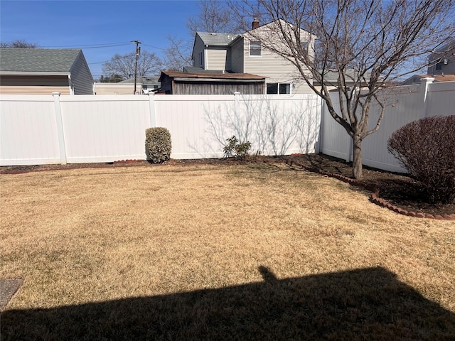 view of yard featuring a fenced backyard