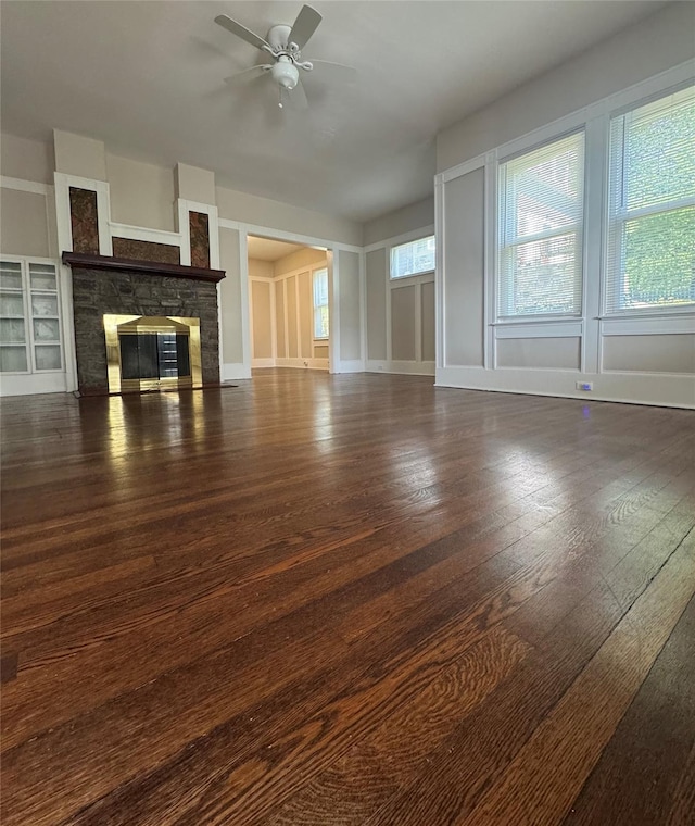 6 Sedgwick Ave, Yonkers, NY 10705 - unfurnished living room with baseboards, a ceiling fan, a fireplace, and hardwood / wood-style floors