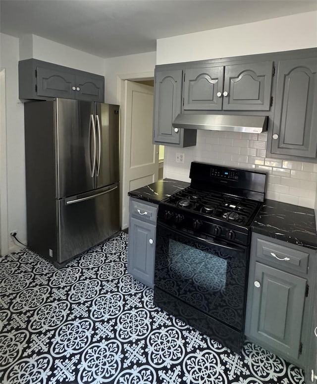 6 Sedgwick Ave, Yonkers, NY 10705 - kitchen with freestanding refrigerator, gray cabinets, gas stove, and extractor fan