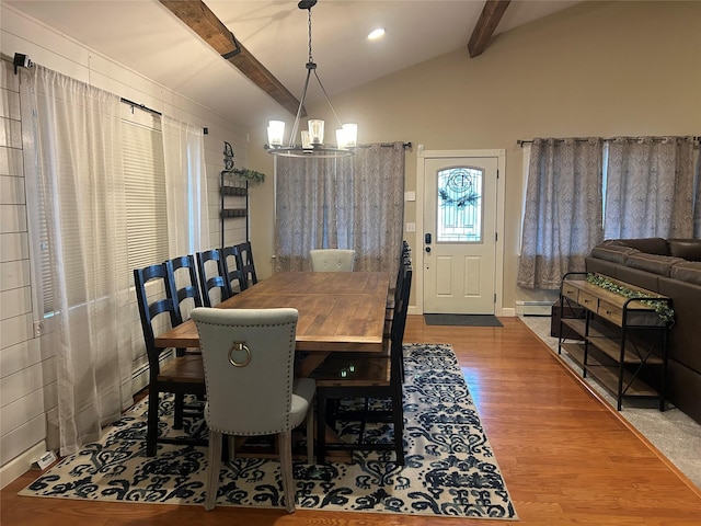 dining room featuring vaulted ceiling with beams, recessed lighting, wood finished floors, a notable chandelier, and a baseboard radiator