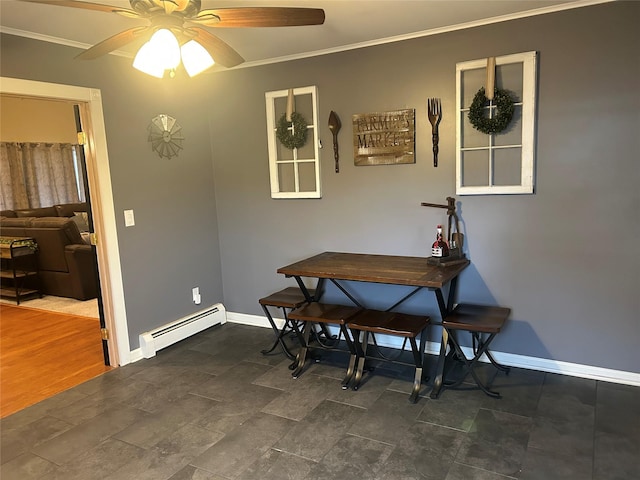 dining area featuring ceiling fan, crown molding, baseboards, and a baseboard radiator