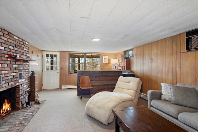 carpeted living area with a wall mounted air conditioner, a fireplace, wood walls, and baseboard heating