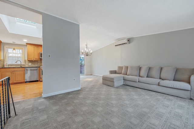 living area featuring baseboards, a chandelier, a wall unit AC, vaulted ceiling, and light carpet