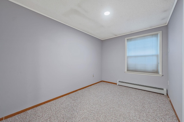 spare room featuring a textured ceiling, baseboards, carpet floors, and a baseboard radiator