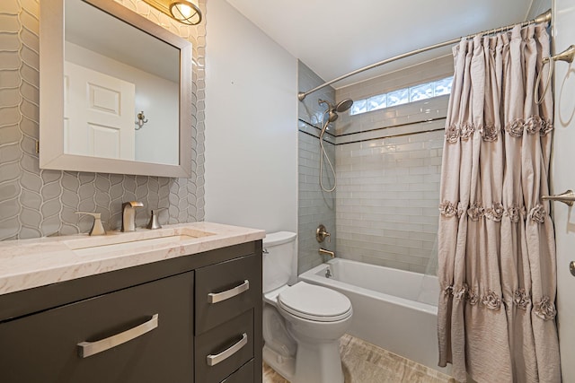 full bathroom featuring decorative backsplash, vanity, toilet, and shower / bath combo with shower curtain