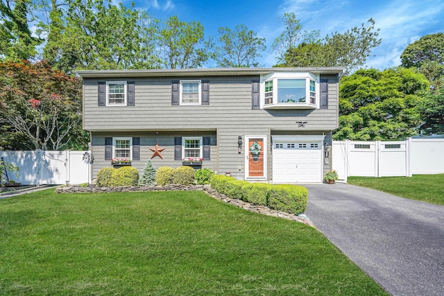 16 Maple Rd, Wading River, NY 11792 - colonial house with a garage and driveway