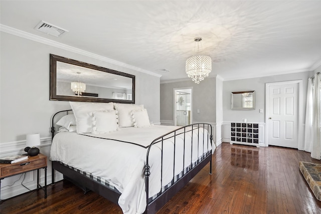 bedroom featuring visible vents, wood-type flooring, and a chandelier