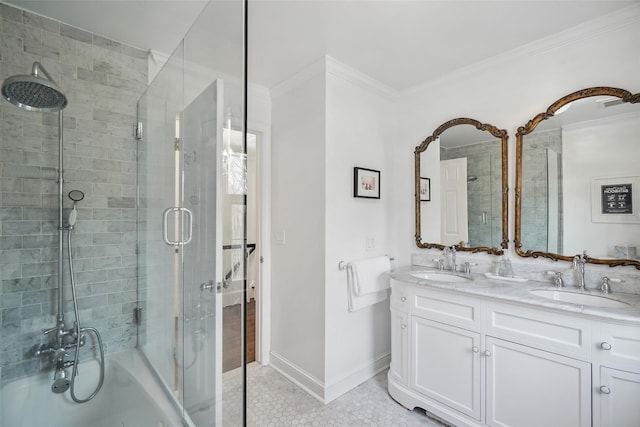 full bathroom with a sink, ornamental molding, a shower with shower door, and a washtub