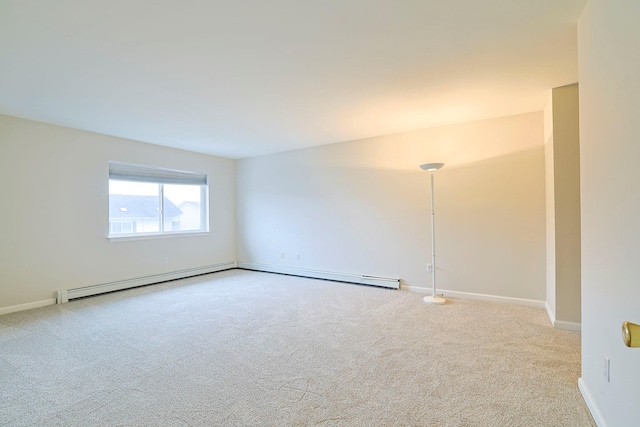 unfurnished room featuring baseboards and carpet floors