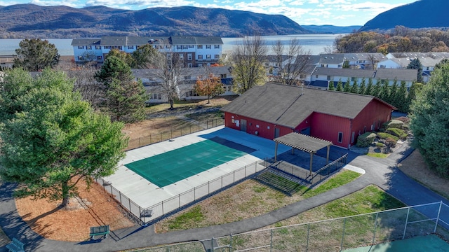 drone / aerial view with a mountain view and a residential view