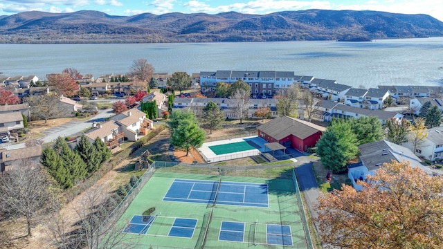 bird's eye view featuring a water and mountain view