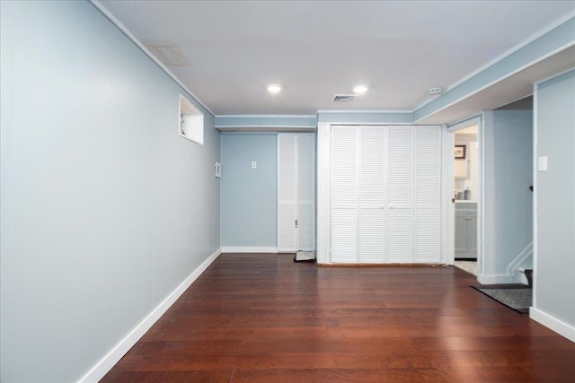 interior space with wood finished floors, visible vents, baseboards, recessed lighting, and stairs