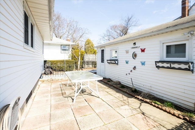 view of patio with fence