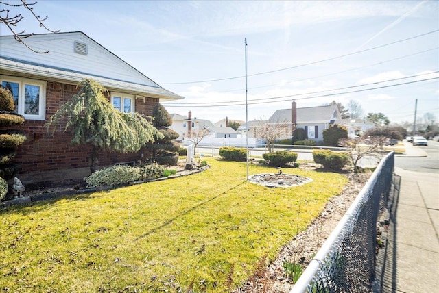 view of yard with fence